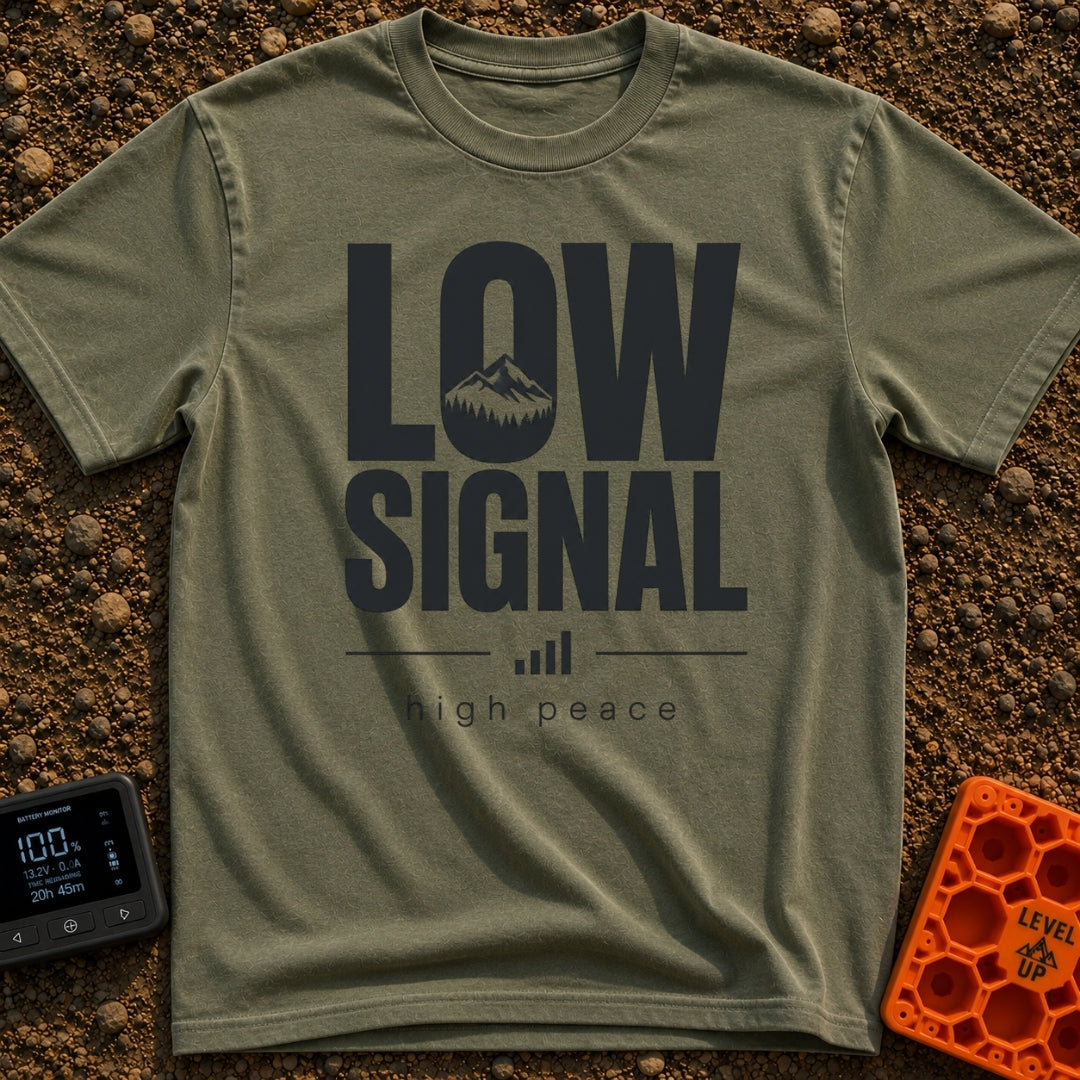 No Signal No Problem - T-Shirt in Moss - The design features the words "LOW SIGNAL" in large, bold typography, with a...