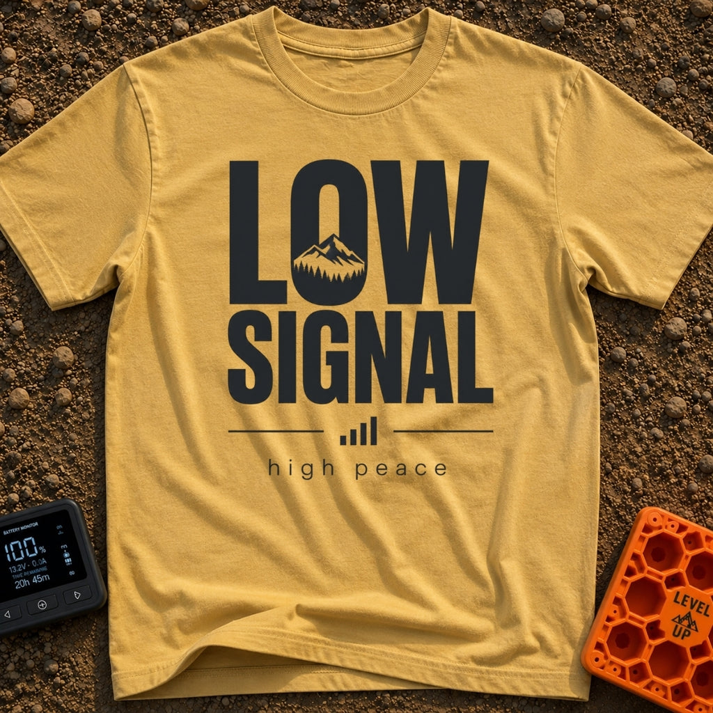 No Signal No Problem - T-Shirt in Mustard - The design features the words "LOW SIGNAL" in large, bold typography, with a...