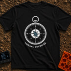 Manual Override Engaged - T-Shirt in Black - A black and white illustration of an analog navigational compass where the...