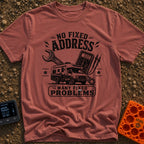 Fixed For Now - T-Shirt in Brick - A black and white illustration of a Class C motorhome positioned in front of a large...