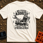 Fixed For Now - T-Shirt in Ivory - A black and white illustration of a Class C motorhome positioned in front of a large...
