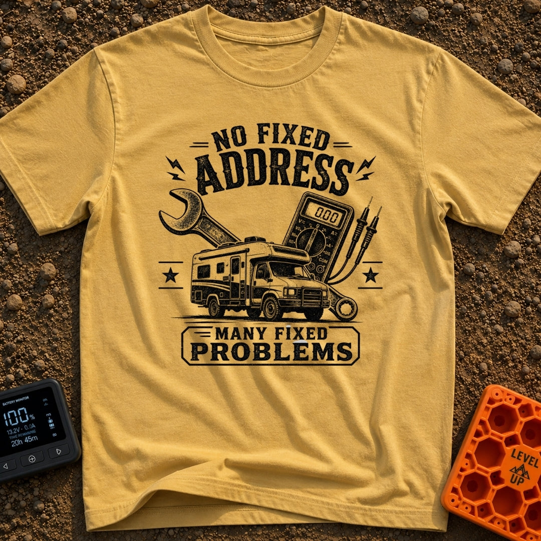 Fixed For Now - T-Shirt in Mustard - A black and white illustration of a Class C motorhome positioned in front of a large...