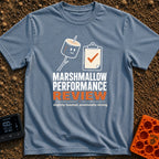 Evaluating Marshmallow Potential - T-Shirt in Blue Jean - A graphic featuring a smiling, lightly toasted marshmallow on a...