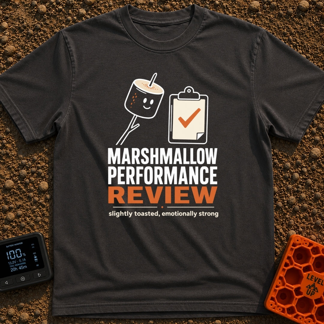 Evaluating Marshmallow Potential - T-Shirt in Graphite - A graphic featuring a smiling, lightly toasted marshmallow on a...