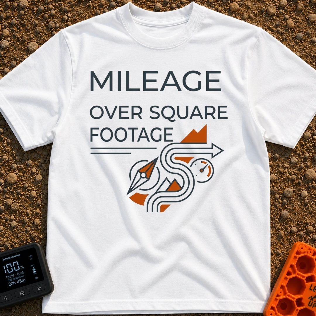 Miles Over Square Feet - T-Shirt in White - The design features the text "MILEAGE OVER SQUARE FOOTAGE" above a line-art...
