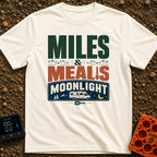 Miles, Meals, Moonlight - T-Shirt in Ivory - A typographic design reading "MILES & MEALS MOONLIGHT" featuring hiking boot...