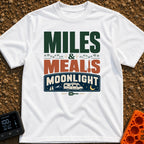 Miles, Meals, Moonlight - T-Shirt in White - A typographic design reading "MILES & MEALS MOONLIGHT" featuring hiking boot...