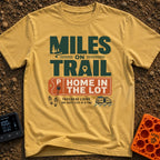 Trail Miles Lot Life - T-Shirt in Mustard - A graphic design with the text "Miles On Trail, Home In The Lot" alongside...