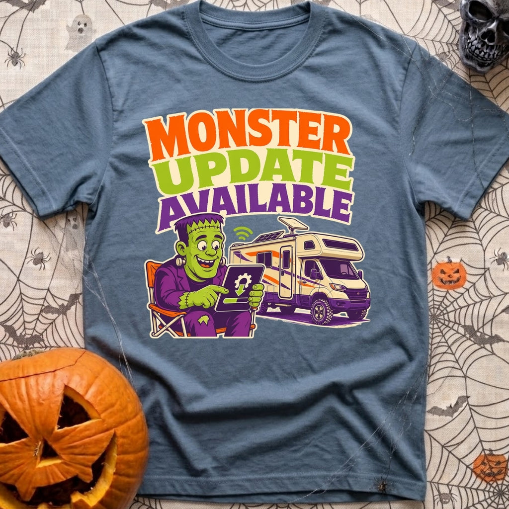 Beast Update Pending - T-Shirt in Blue Jean - A cartoon illustration of Frankenstein's monster sitting in a camp chair,...