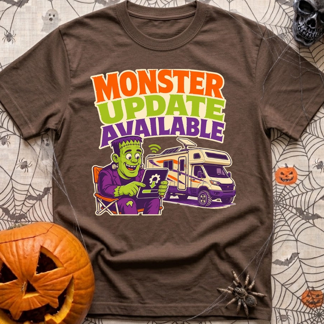 Beast Update Pending - T-Shirt in Espresso - A cartoon illustration of Frankenstein's monster sitting in a camp chair,...
