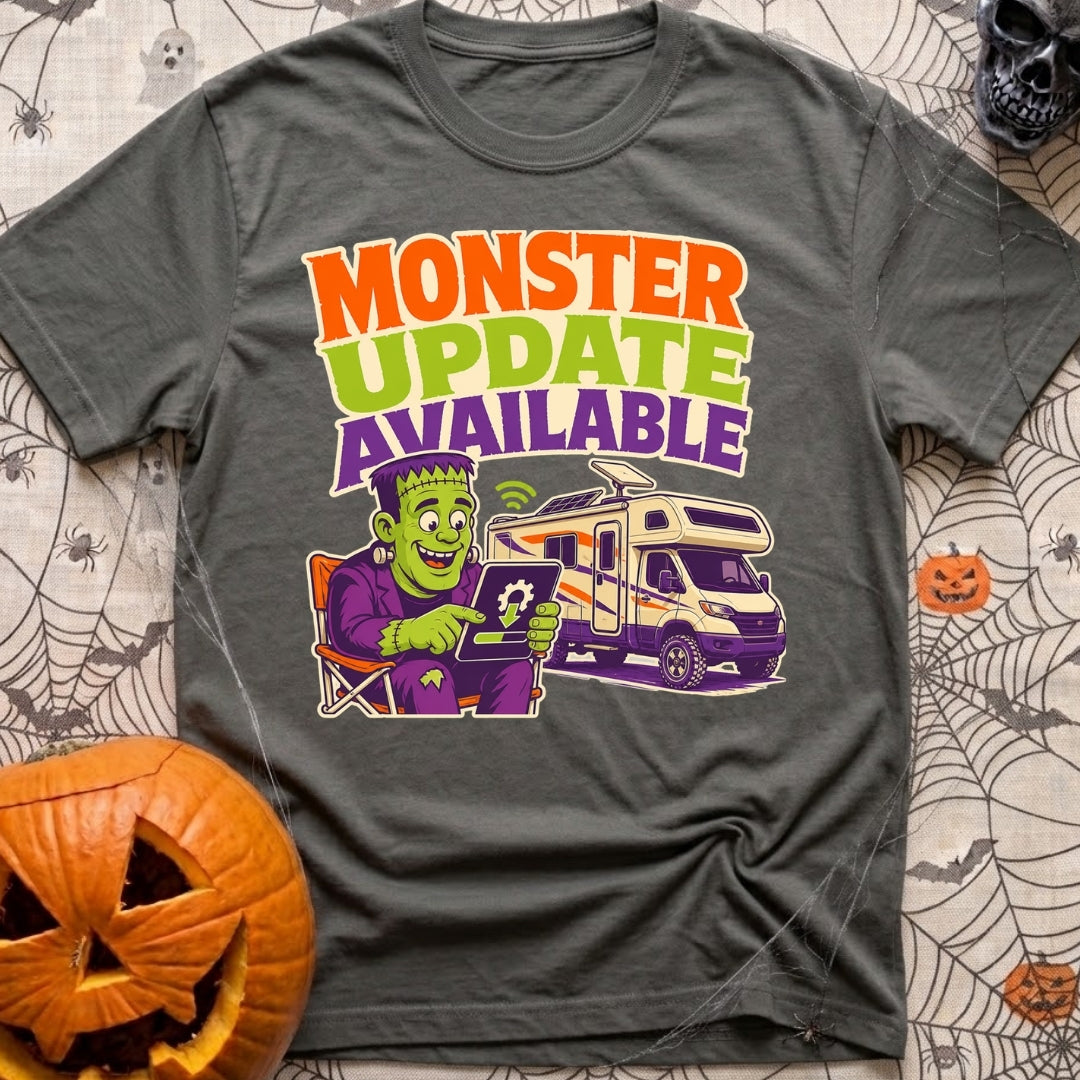 Beast Update Pending - T-Shirt in Pepper - A cartoon illustration of Frankenstein's monster sitting in a camp chair,...