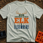 Between Elk And Elsewhere - T-Shirt in Bay - A typographic design featuring a pair of elk antlers at the top above the...