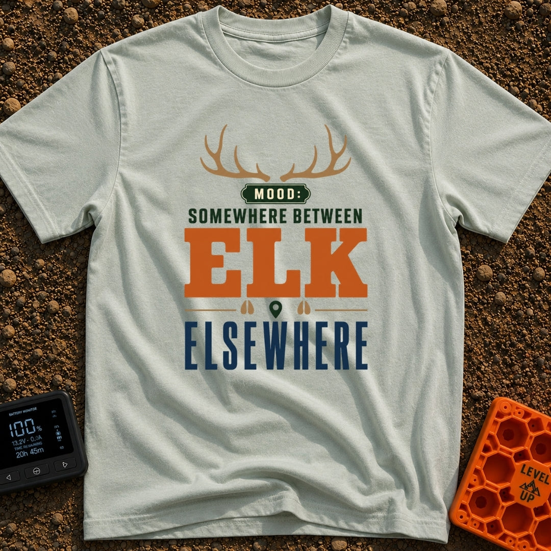 Between Elk And Elsewhere - T-Shirt in Bay - A typographic design featuring a pair of elk antlers at the top above the...