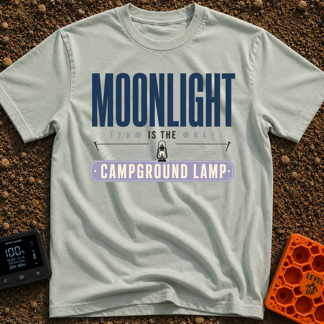 Nature's Night Light - T-Shirt in Bay - A typographic design reading "MOONLIGHT IS THE CAMPGROUND LAMP" featuring a...