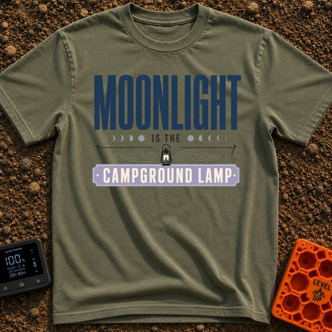 Nature's Night Light - T-Shirt in Moss - A typographic design reading "MOONLIGHT IS THE CAMPGROUND LAMP" featuring a...