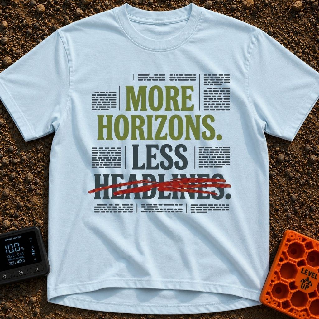 Views Over News - T-Shirt in Chambray - A text-based graphic featuring the phrase "MORE HORIZONS. LESS HEADLINES." with...