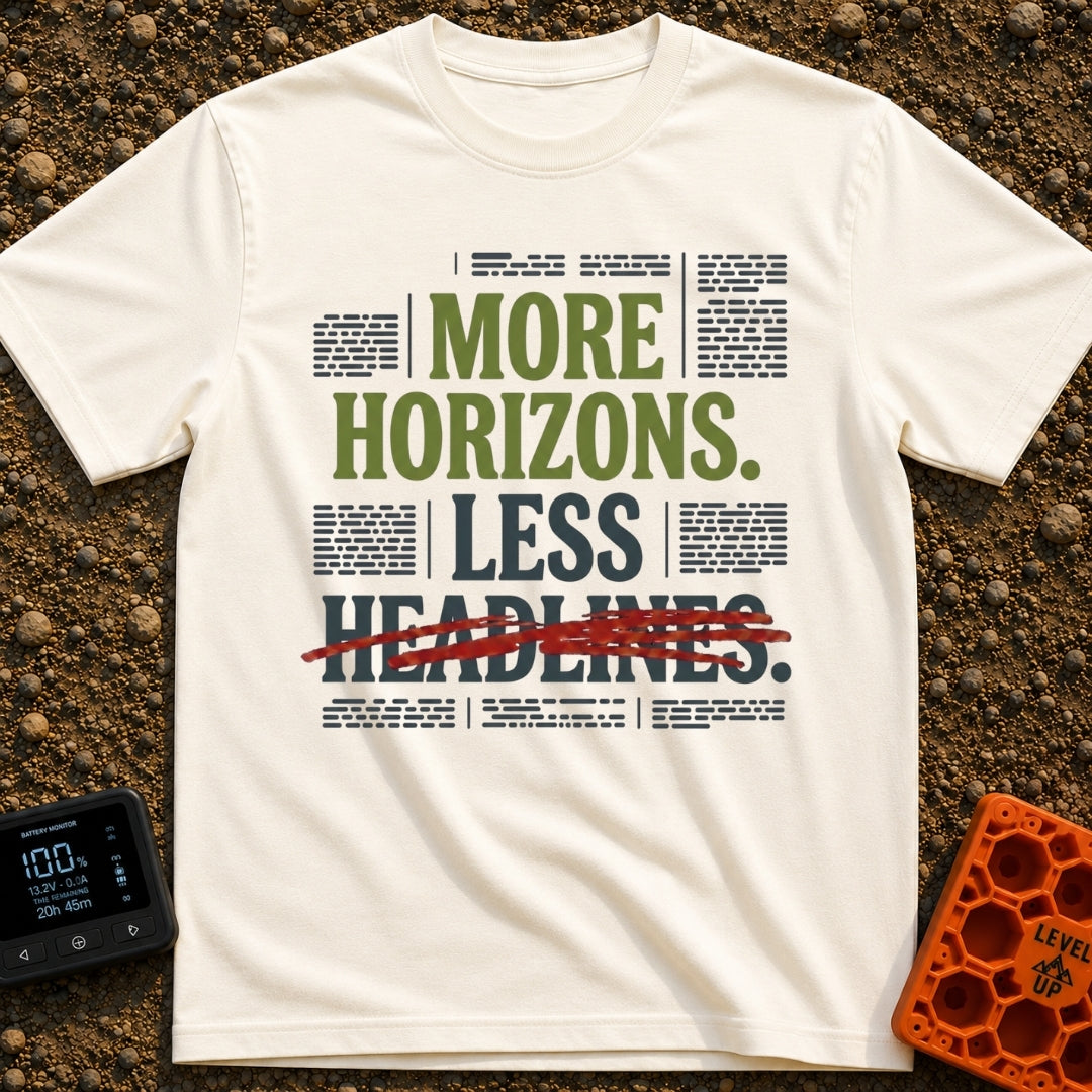 Views Over News - T-Shirt in Ivory - A text-based graphic featuring the phrase "MORE HORIZONS. LESS HEADLINES." with the...