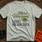 Horizons Over Headlines - T-Shirt in Bay - The design features the phrase "More Horizons." in an olive green script font...
