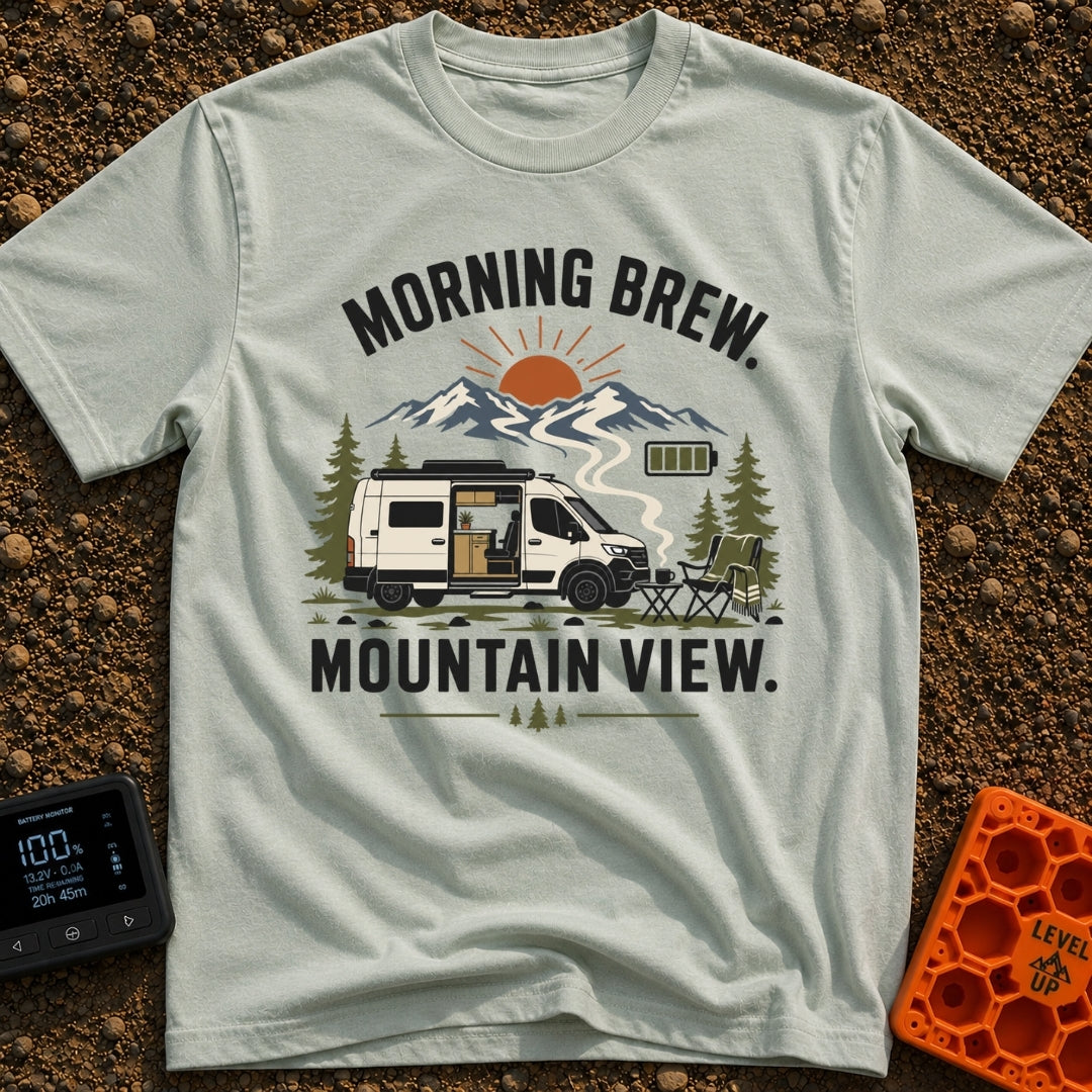 Brew With A View - T-Shirt in Bay - A white camper van with its side door open to reveal interior cabinets and a potted...
