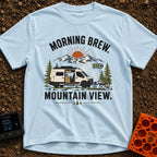 Brew With A View - T-Shirt in Chambray - A white camper van with its side door open to reveal interior cabinets and a...