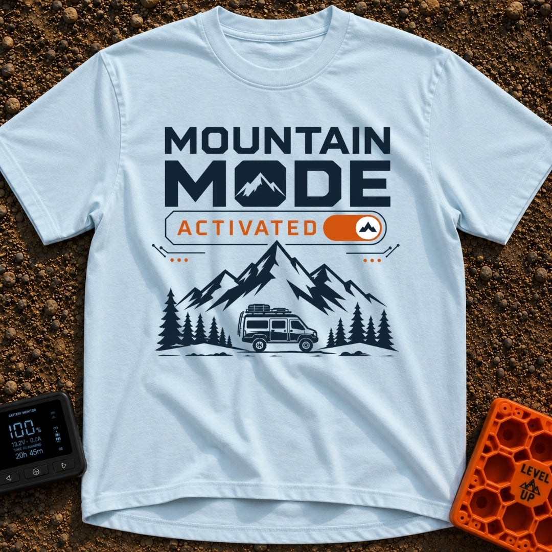 Mountain Mode On - T-Shirt in Chambray - The design features bold text reading "MOUNTAIN MODE" above an orange digital...