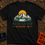 Peak View Upgrade - T-Shirt in Black - A graphical illustration of a Class C motorhome parked in front of a pine forest...