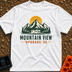 Peak View Upgrade - T-Shirt in White - A graphical illustration of a Class C motorhome parked in front of a pine forest...