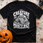 Mud Sweat And Gears - T-Shirt in Black - A distressed black and white illustration of a dripping mud monster aggressively...