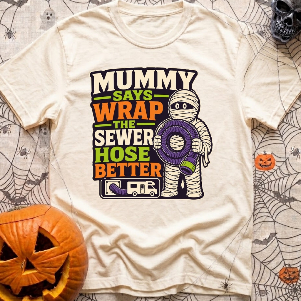 Mummy Says Wrap It - T-Shirt in Ivory - A cartoon illustration of a mummy holding a coiled purple RV sewer hose,...