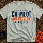 My Copilot Has Paws - T-Shirt in Bay - A typography-based design featuring the text 'MY CO-PILOT' in large blue letters...