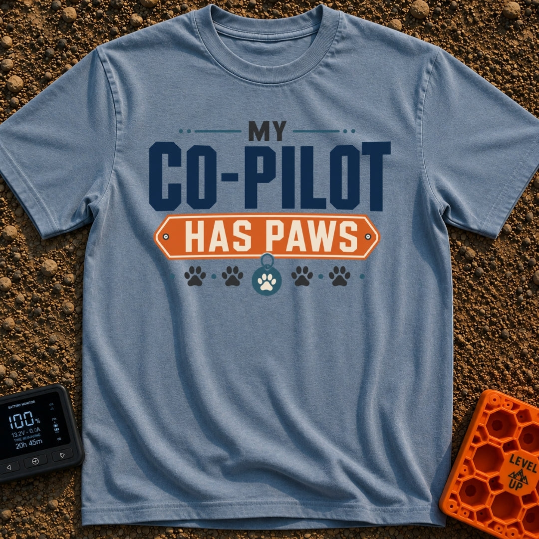 My Copilot Has Paws - T-Shirt in Blue Jean - A typography-based design featuring the text 'MY CO-PILOT' in large blue...
