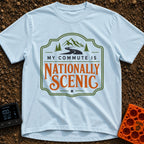 My Nationally Scenic Commute - T-Shirt in Chambray - A vintage-style badge design featuring a winding black road leading...