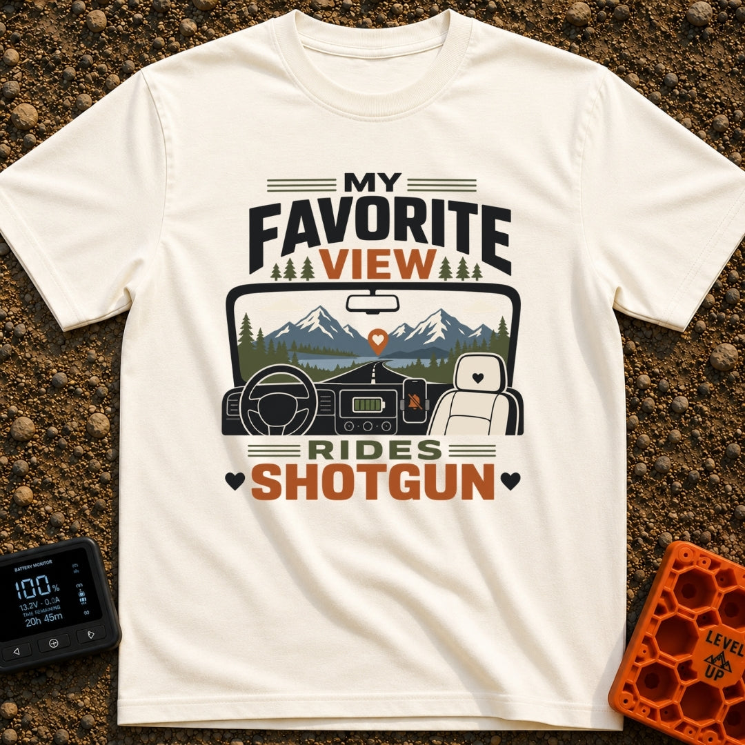 Front Seat Views - T-Shirt in Ivory - A view from inside a vehicle looking out the windshield at a road leading to...