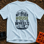 My Other House Rolls - T-Shirt in Chambray - A typographic badge design reading 'MY OTHER HOUSE HAS WHEELS' featuring...