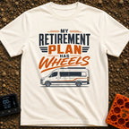 Rolling Retirement Plan - T-Shirt in Ivory - A graphic with the text "MY RETIREMENT PLAN HAS WHEELS" in bold orange and...
