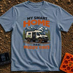 Smart Home On Wheels - T-Shirt in Blue Jean - A rugged camper van with muddy tires, a rooftop solar panel, a side battery...