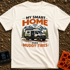 Smart Home On Wheels - T-Shirt in Ivory - A rugged camper van with muddy tires, a rooftop solar panel, a side battery...