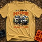 Smart Home On Wheels - T-Shirt in Mustard - A rugged camper van with muddy tires, a rooftop solar panel, a side battery...