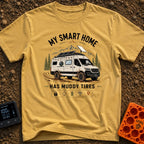 Mud-Covered Smart Home - T-Shirt in Mustard - An illustration of a mud-splattered white camper van equipped with a...