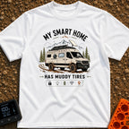 Mud-Covered Smart Home - T-Shirt in White - An illustration of a mud-splattered white camper van equipped with a...