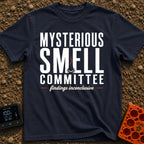Mysterious Smell Commit - T-Shirt in Navy - The design features the text "MYSTERIOUS SMELL COMMITTEE" in large block...