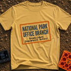 Established Somewhere Better - T-Shirt in Mustard - A graphic resembling a distressed rectangular rubber stamp with an...