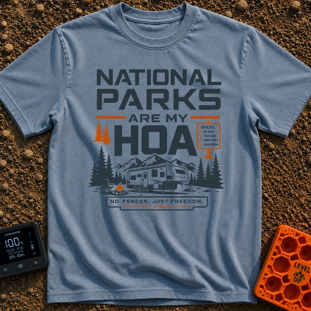 Nature Is My HOA - T-Shirt in Blue Jean - A graphic of a fifth-wheel RV parked in front of a mountain range and pine...