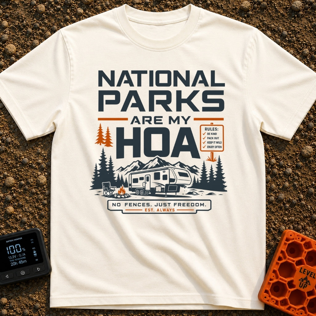 Nature Is My HOA - T-Shirt in Ivory - A graphic of a fifth-wheel RV parked in front of a mountain range and pine trees....