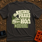 Nature Is My HOA - T-Shirt in Graphite - A graphic featuring a Class A motorhome parked in front of pine trees,...