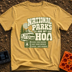 Nature Is My HOA - T-Shirt in Mustard - A graphic featuring a Class A motorhome parked in front of pine trees, mountains,...