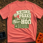 Nature Is My HOA - T-Shirt in Watermelon - A graphic featuring a Class A motorhome parked in front of pine trees,...