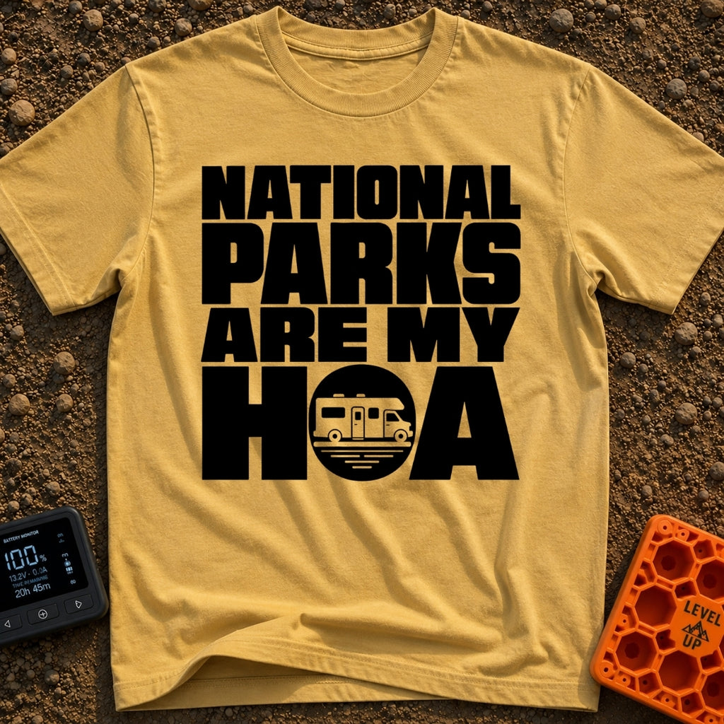 Parks Are My HOA - T-Shirt in Mustard - Bold black text that reads "NATIONAL PARKS ARE MY HOA", where the letter "O" in...