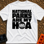Parks Are My HOA - T-Shirt in White - Bold black text that reads "NATIONAL PARKS ARE MY HOA", where the letter "O" in HOA...