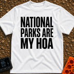 Parks Are My HOA - T-Shirt in White - A text-only design featuring the phrase "NATIONAL PARKS ARE MY HOA" in large, bold,...